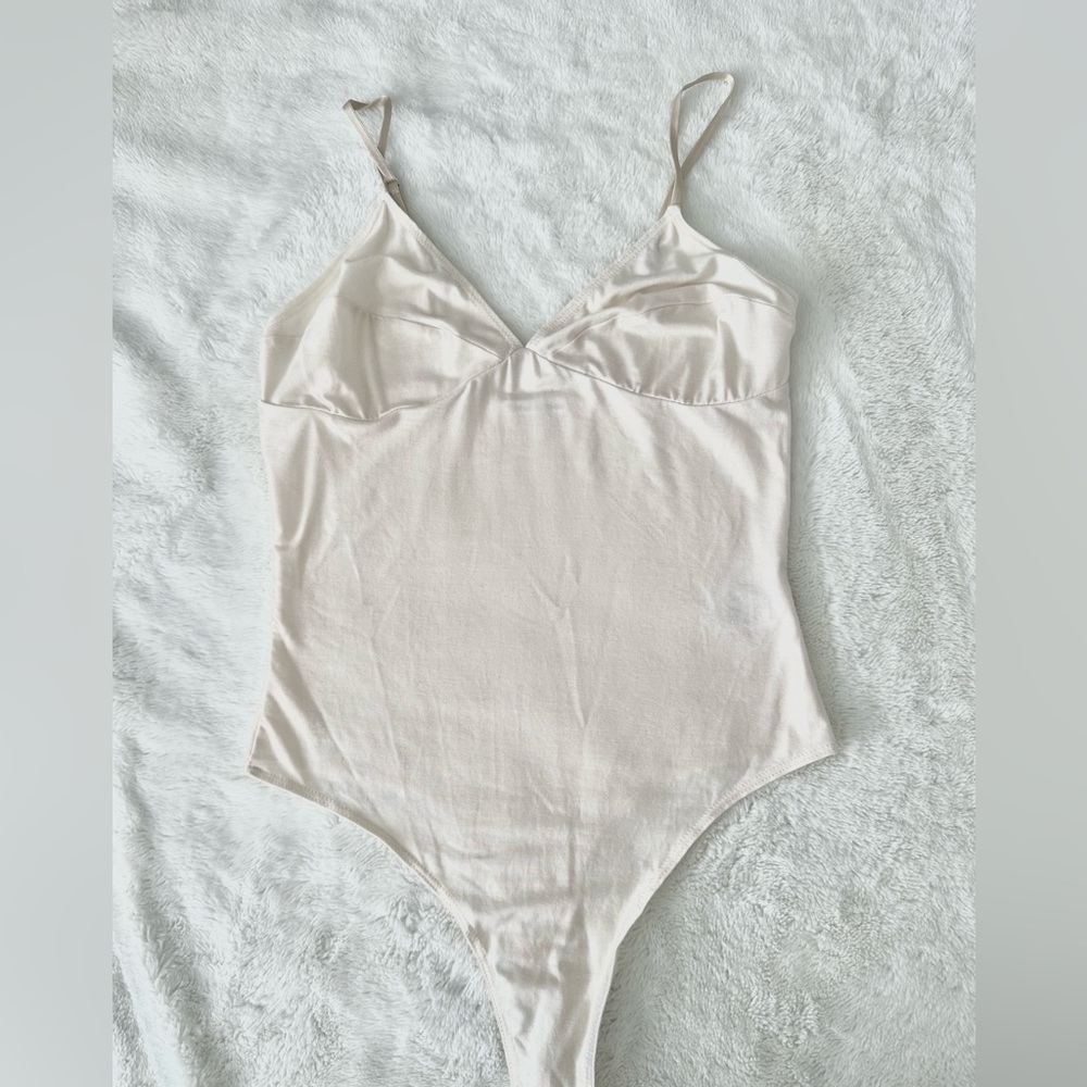 Reformation body suit